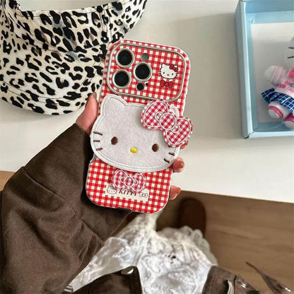 Hello Kitty Red Checkered iPhone Cover with 3D Bow featured in red and white checkered design with plush bow accent.